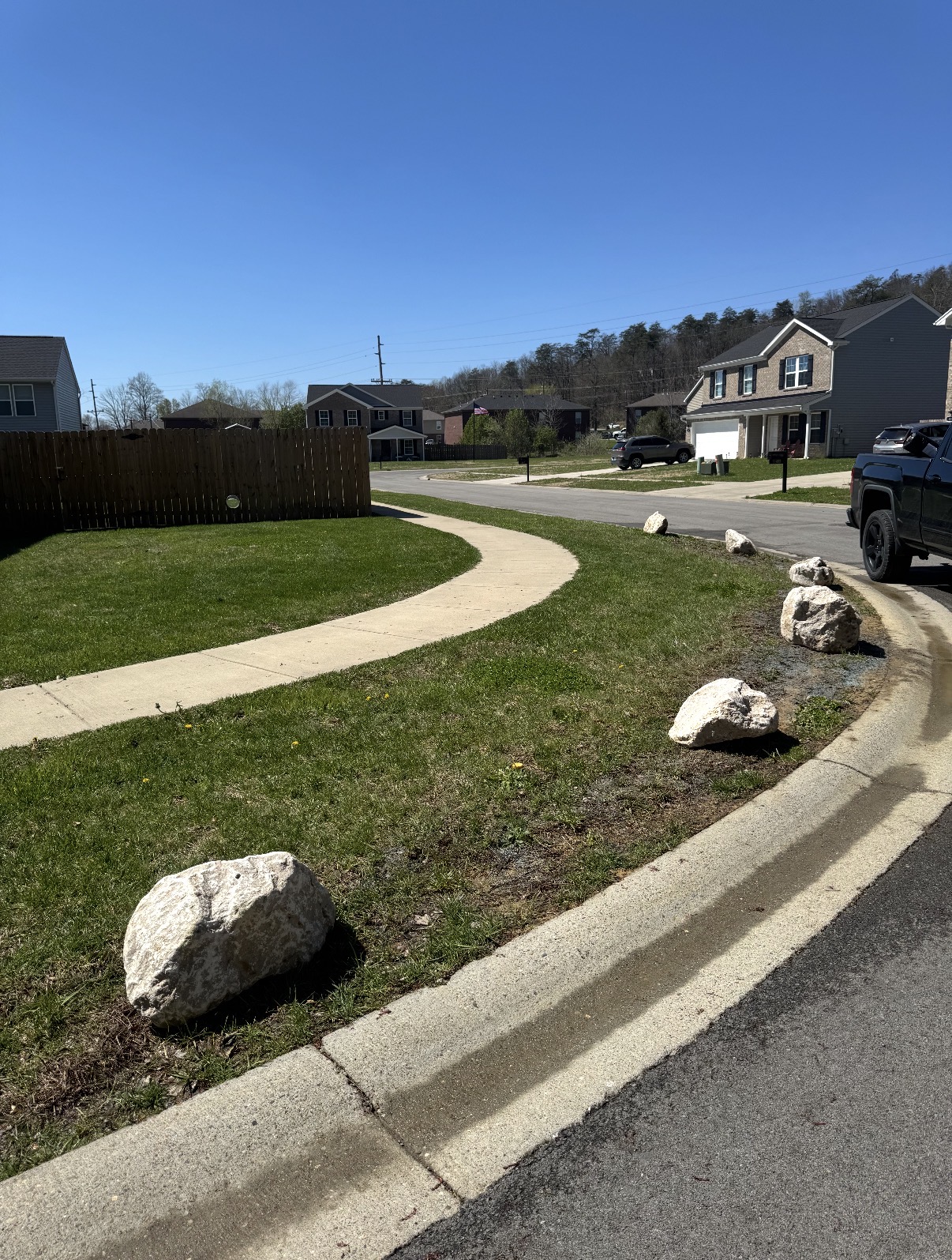 Decorative boulders along walkway